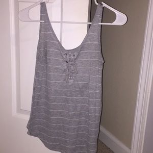 grey and white stripped tank